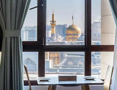 8 هتل با ویو حرم امام رضا (ع) نمای اتاق، رستوران و روف گاردن